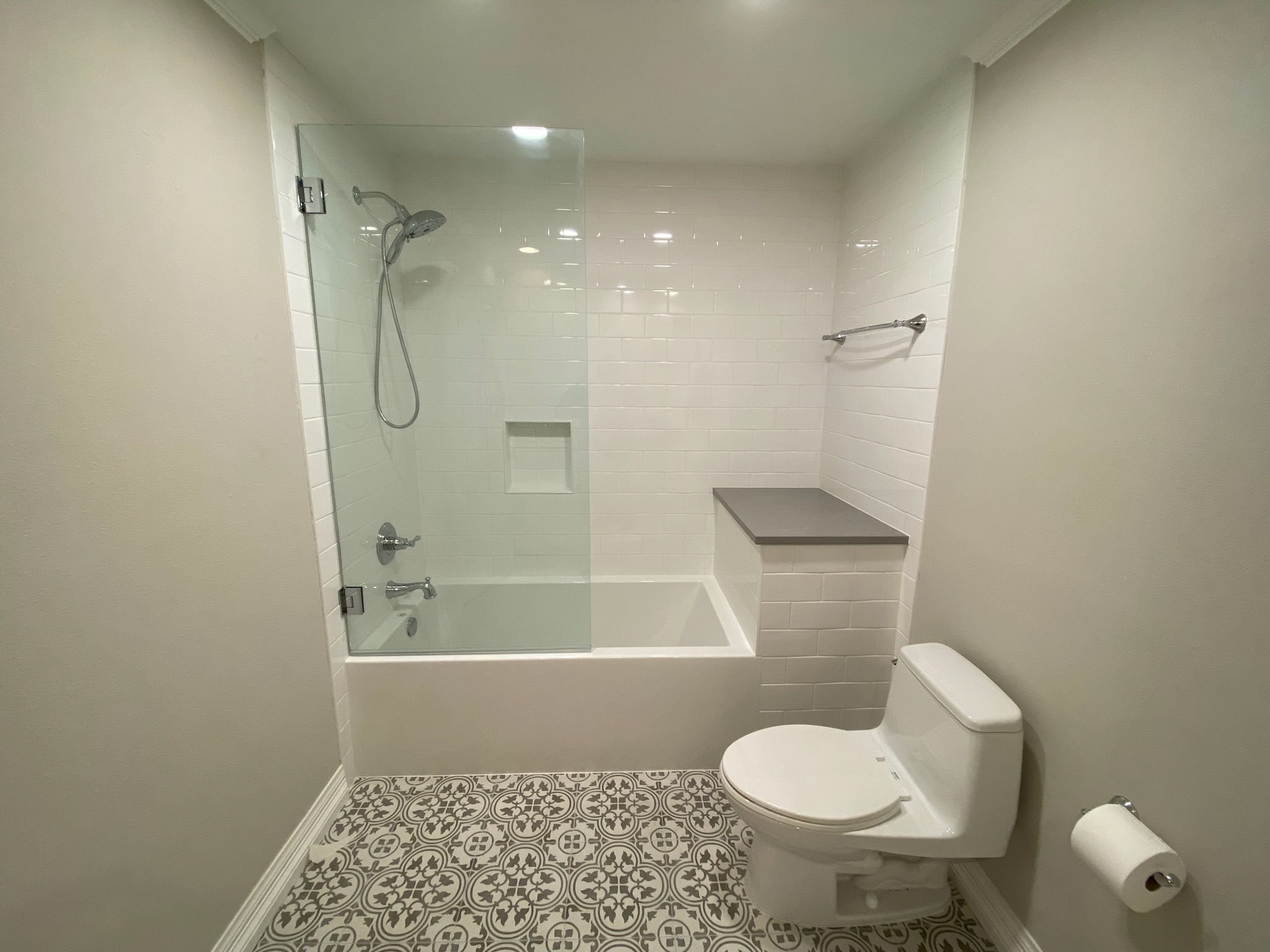 Modern bathroom with shower and toilet and Bathroom Remodeling Carrollton Contractors.